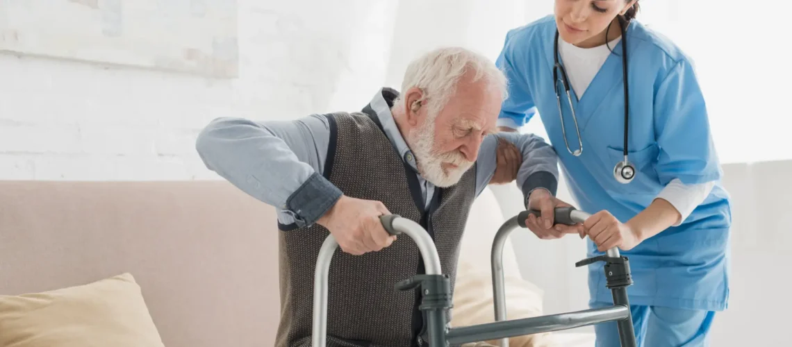 Elderly man receiving in-home physical therapy to improve strength and balance.